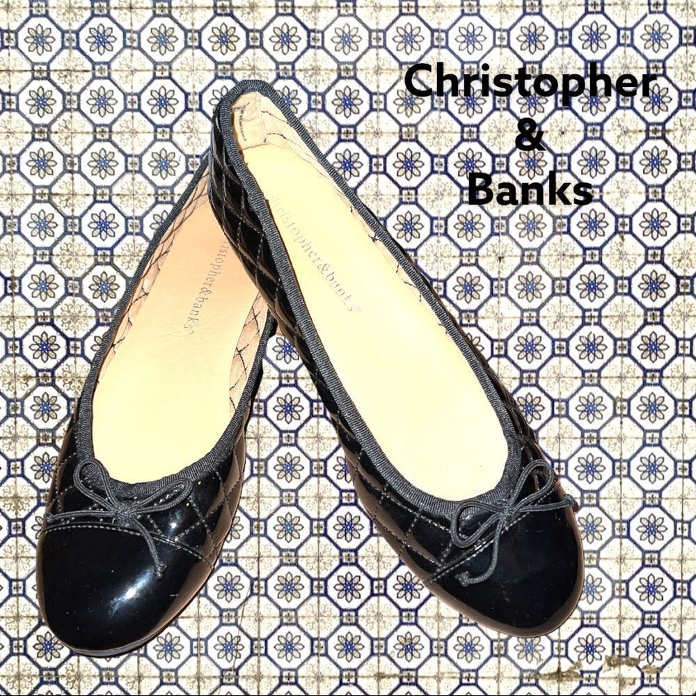 Christopher & Banks black patten leather quilted look design with tie on front